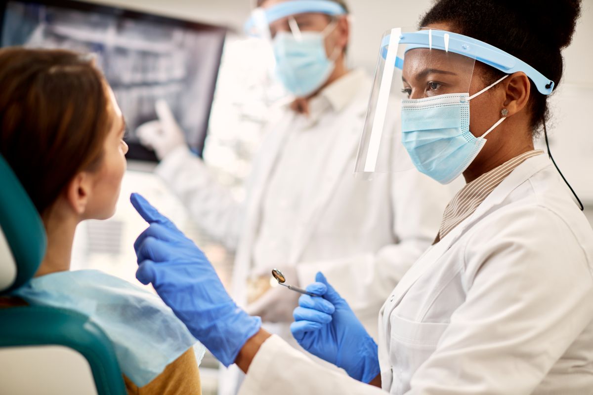 Dentist exaime before tooth implant