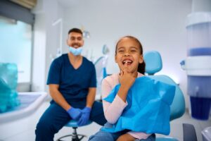 happy-black-little-girl-pointing-at-her-healthy-te-2024-12-13-21-34-32-utc - Synergy Dental Myofunctional Therapy