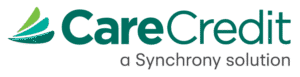 CareCredit logo in teal with a green swoosh icon and the tagline 'a Synchrony solution'.